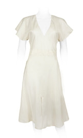 ivory chiffon silk, entirely lined, fitted waistline with flounced sleeves and deep V-neckline