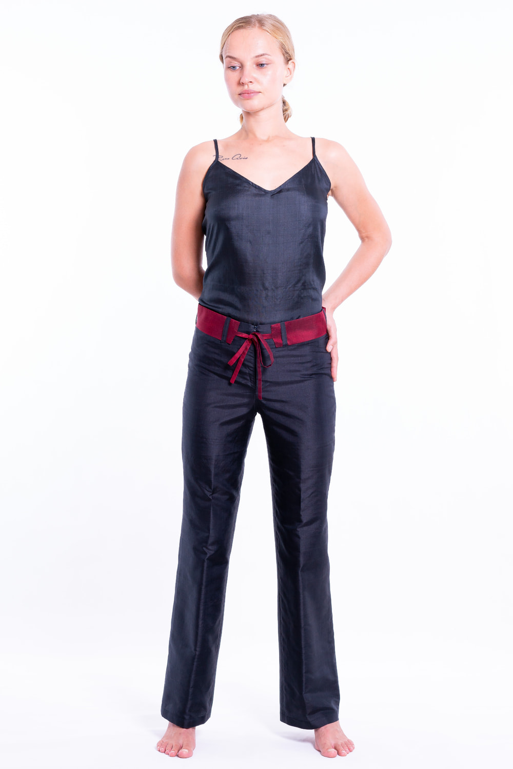 natural silk trousers in black and cherry red, straight leg, invisible zip and removable contrasting belt, black silk caraco