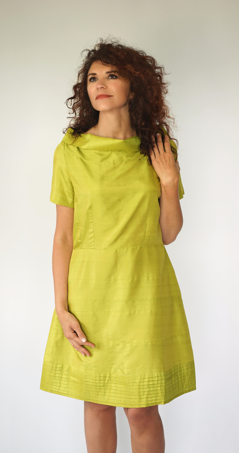 yellow, green short sleeves dress in natural silk, raised boat neckline, tulip-shaped, fair-trade certified