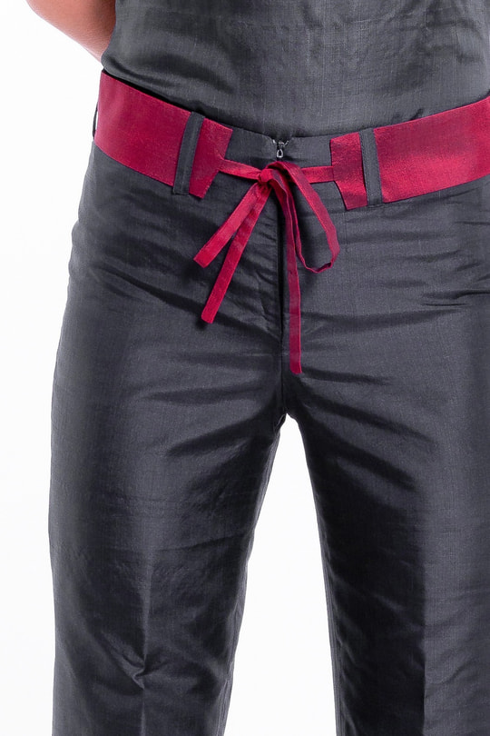 natural silk trousers in black and cherry red, straight leg, invisible zip and removable contrasting belt, fair-trade certified