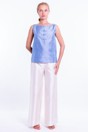 blue raw silk top with Mao buttonholes and off white silk trousers